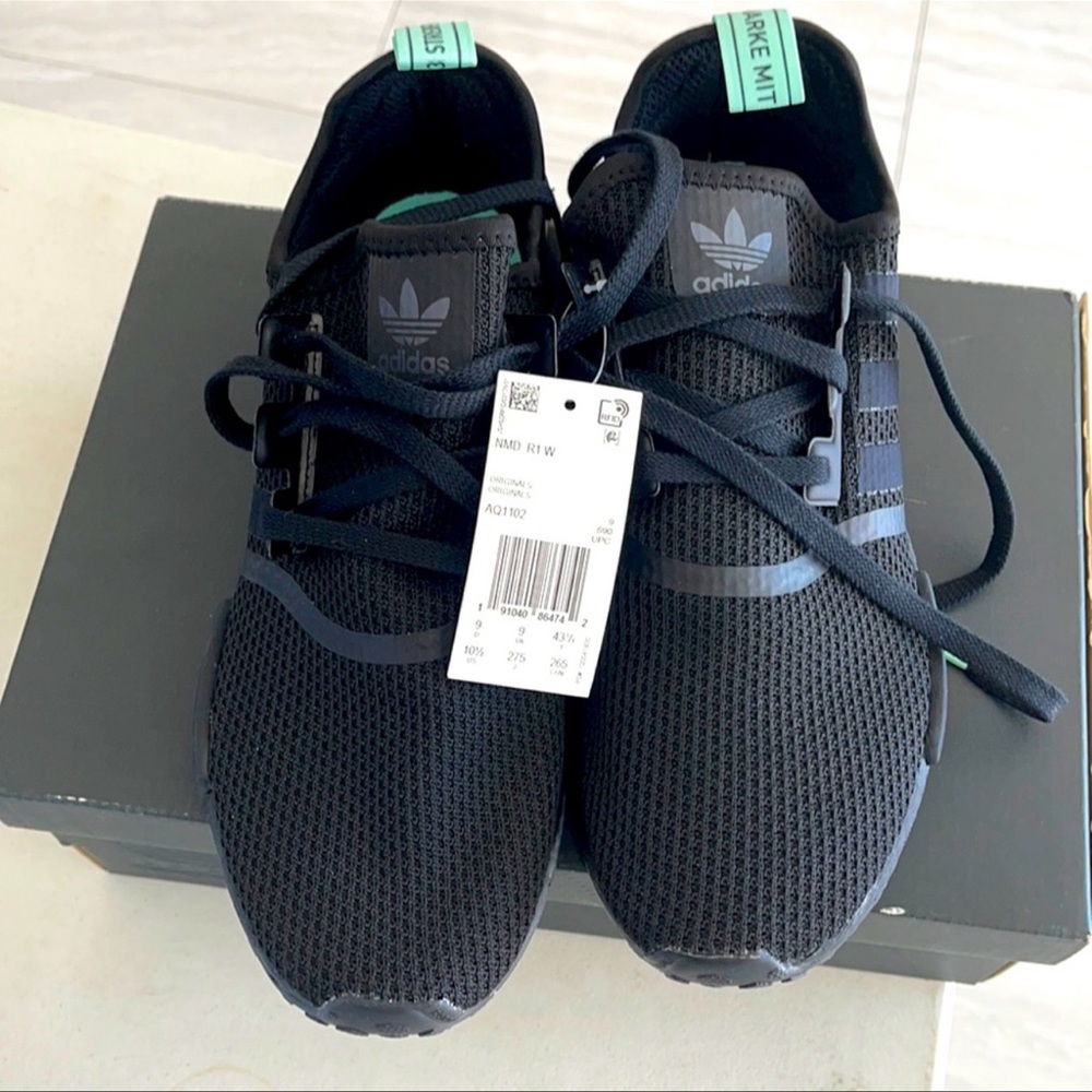Brand new never worn Triple Black NMD’s